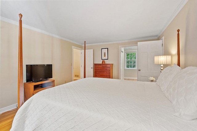 114 Hunters Ridge Rd, Concord, MA 01742 - bedroom featuring crown molding, baseboards, and wood finished floors