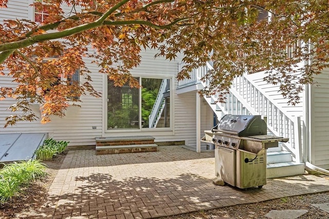 114 Hunters Ridge Rd, Concord, MA 01742 - back of house with a patio area, entry steps, and stairway