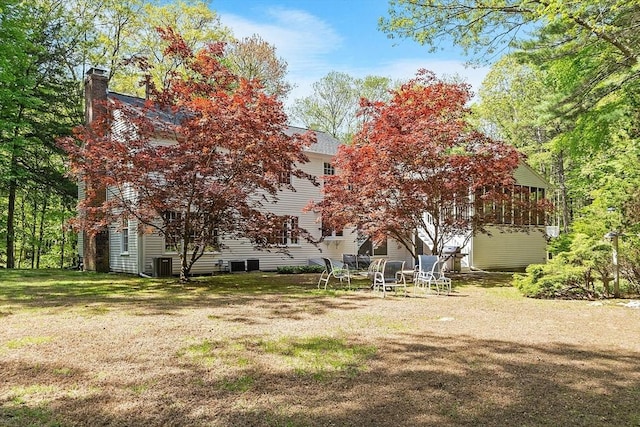 114 Hunters Ridge Rd, Concord, MA 01742 - view of green lawn with central AC unit
