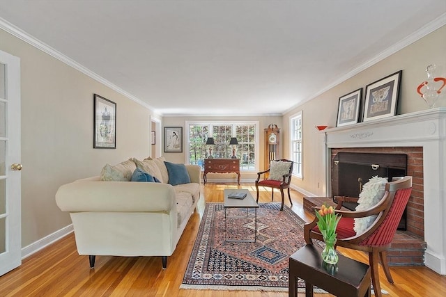 114 Hunters Ridge Rd, Concord, MA 01742 - living area with wood finished floors, baseboards, ornamental molding, and a brick fireplace