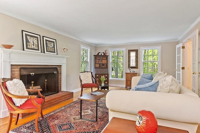 114 Hunters Ridge Rd, Concord, MA 01742 - living room with ornamental molding, wood finished floors, a brick fireplace, and baseboards