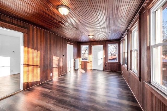 unfurnished sunroom with radiator