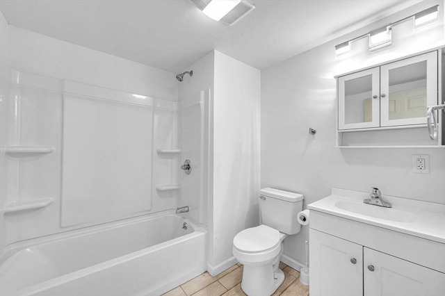 full bathroom featuring tile patterned flooring, vanity, shower / bath combination, and toilet