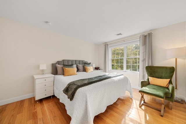 bedroom with light hardwood / wood-style flooring