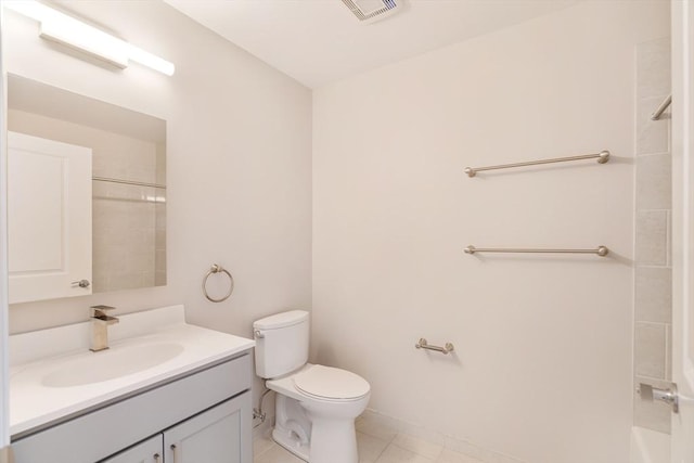 bathroom with vanity, toilet, a shower, and visible vents