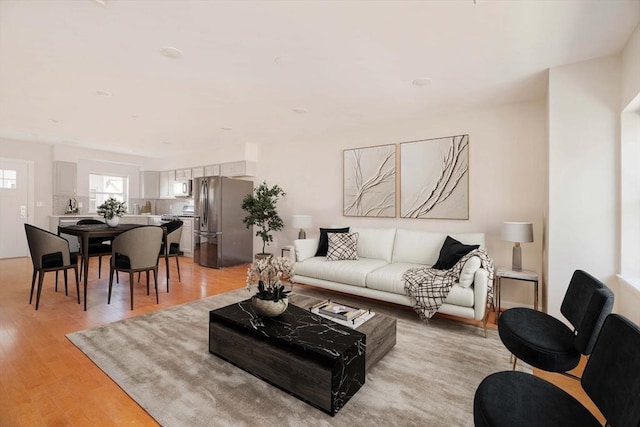 living room featuring light wood-type flooring