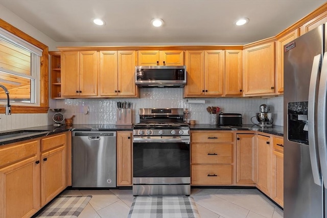 kitchen featuring a sink, open shelves, stainless steel appliances, decorative backsplash, and light tile patterned flooring