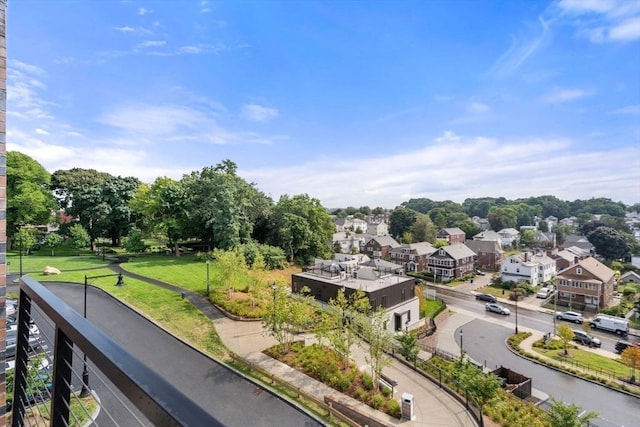 birds eye view of property with a residential view