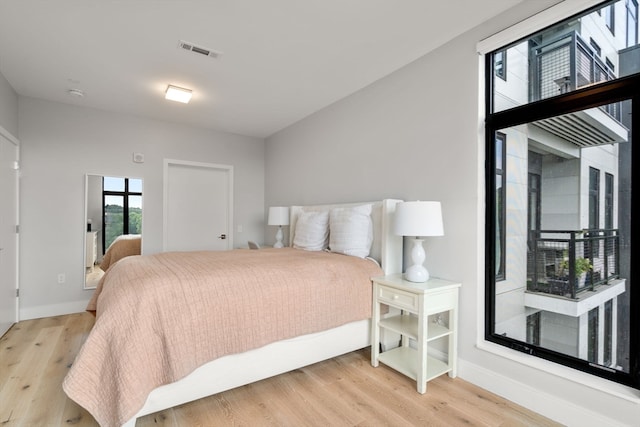 bedroom featuring light wood-type flooring