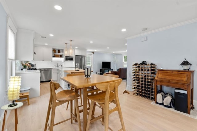 23 Union St Unit 2, Salem, MA 01970 - dining room with light wood-style flooring, recessed lighting, and crown molding