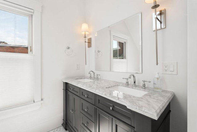 23 Union St Unit 2, Salem, MA 01970 - full bathroom with double vanity, healthy amount of natural light, and marble finish flooring