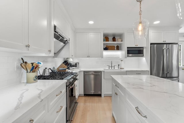 23 Union St Unit 2, Salem, MA 01970 - kitchen with premium appliances, open shelves, recessed lighting, exhaust hood, and white cabinets