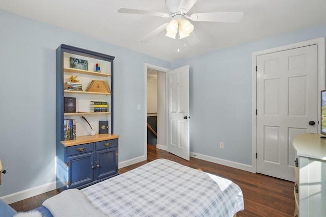 bedroom with dark wood finished floors, baseboards, and ceiling fan