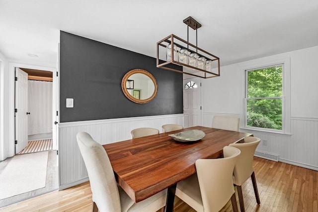 17 High St, Merrimac, MA 01860 - dining space with a wainscoted wall and light wood-type flooring