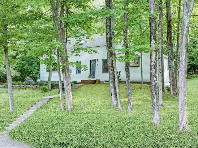 17 High St, Merrimac, MA 01860 - view of front of house featuring a front lawn and roof with shingles