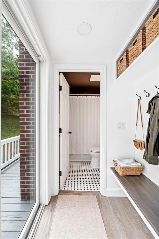 17 High St, Merrimac, MA 01860 - mudroom featuring wood finished floors and baseboards