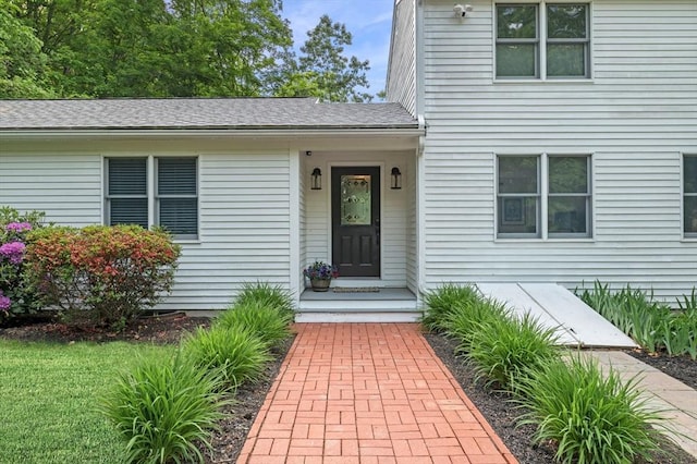 17 High St, Merrimac, MA 01860 - doorway to property featuring roof with shingles
