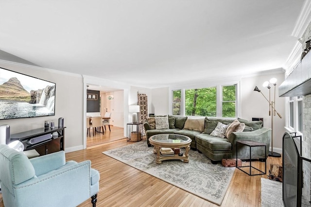 17 High St, Merrimac, MA 01860 - living area featuring crown molding, wood finished floors, and baseboards