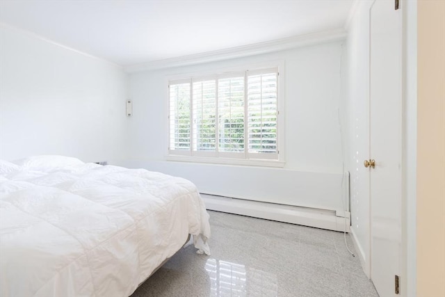 bedroom featuring baseboard heating and ornamental molding