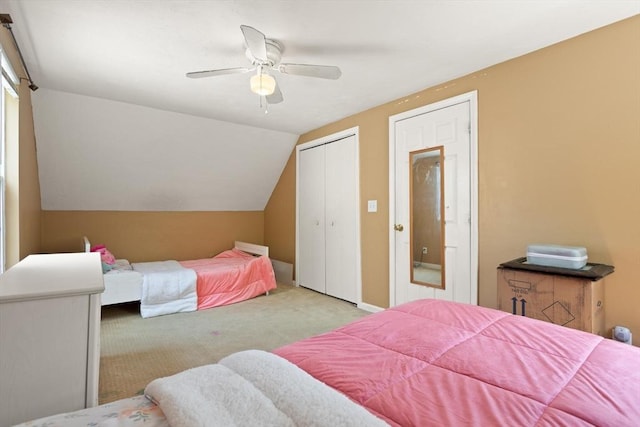 bedroom featuring carpet floors, a ceiling fan, and lofted ceiling