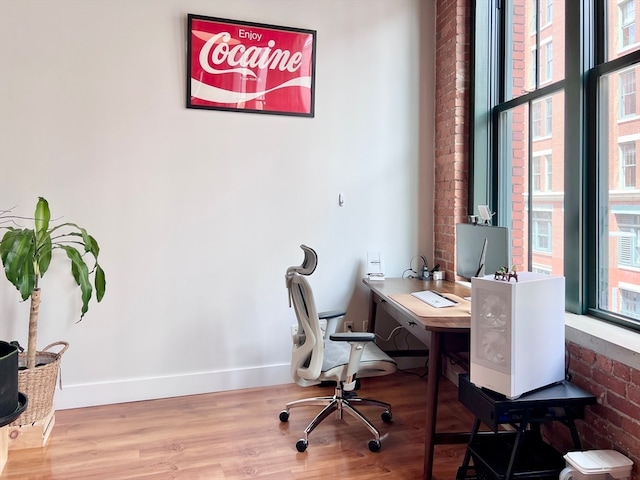 office with light hardwood / wood-style floors