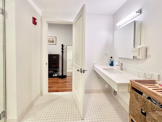 bathroom featuring hardwood / wood-style floors and sink