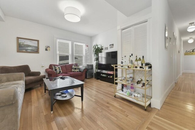 893 E 4th St, Boston, MA 02127 - living area with hardwood / wood-style floors and baseboards