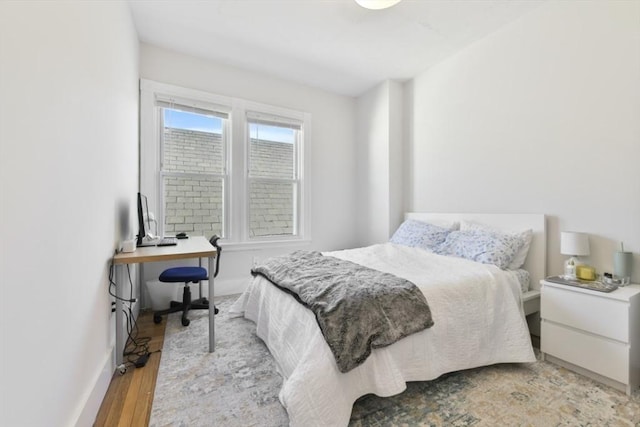 893 E 4th St, Boston, MA 02127 - bedroom with light wood finished floors and baseboards