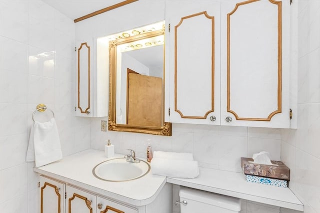 35 Freeman Ave, Boston, MA 02132 - bathroom with vanity, backsplash, and tile walls