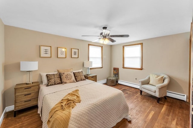 35 Freeman Ave, Boston, MA 02132 - bedroom featuring baseboard heating, wood finished floors, and ceiling fan