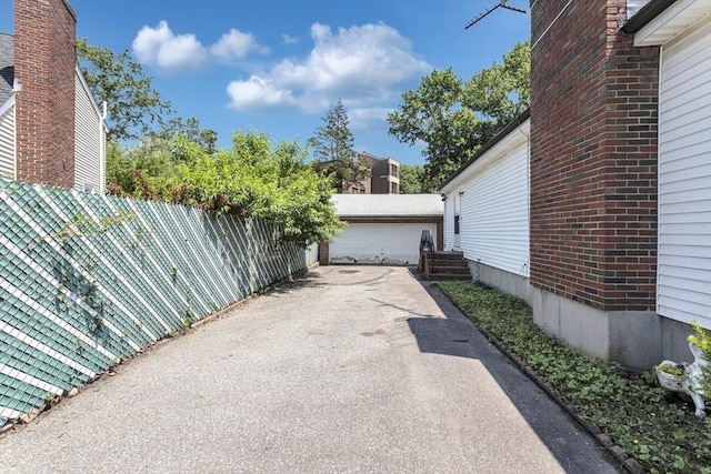 35 Freeman Ave, Boston, MA 02132 - view of patio / terrace with an outdoor structure and a detached garage