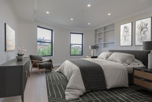 577 Massachusetts Ave Ph, Ph, Boston, MA 02118 - bedroom featuring ornamental molding, recessed lighting, wood finished floors, and baseboards