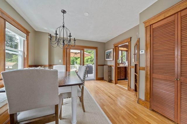 41 Dale Ave, Quincy, MA 02169 - dining room with light wood-type flooring and a chandelier
