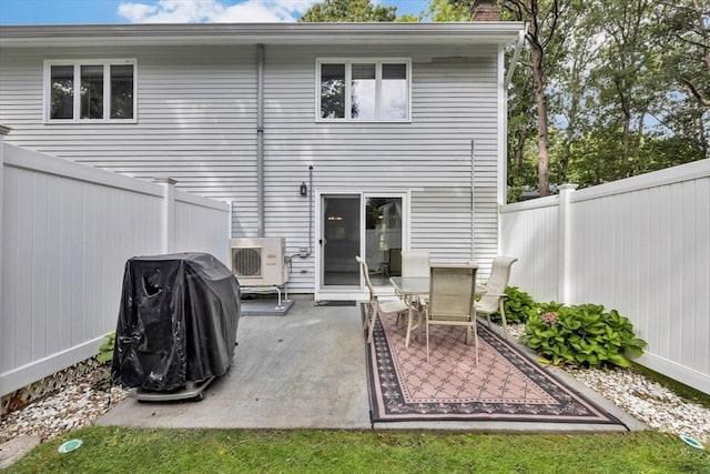 rear view of property featuring a patio area