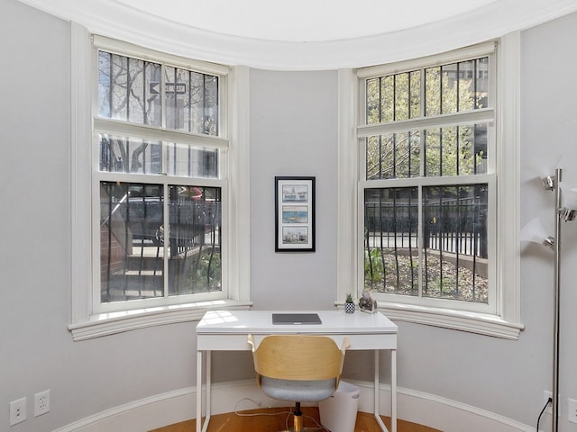 office area featuring baseboards