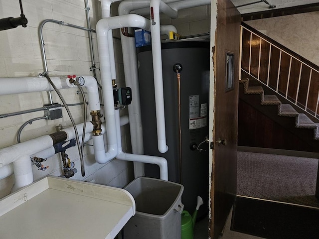 utility room with water heater