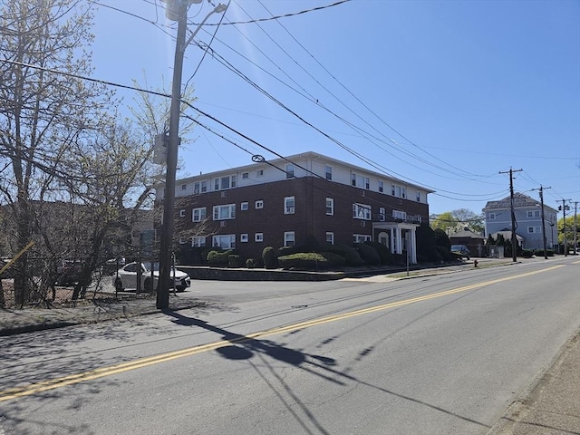 view of road featuring sidewalks and curbs