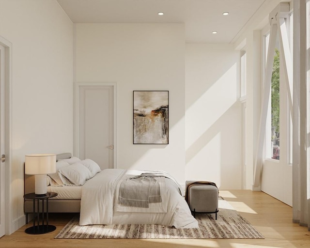 bedroom with light wood-type flooring