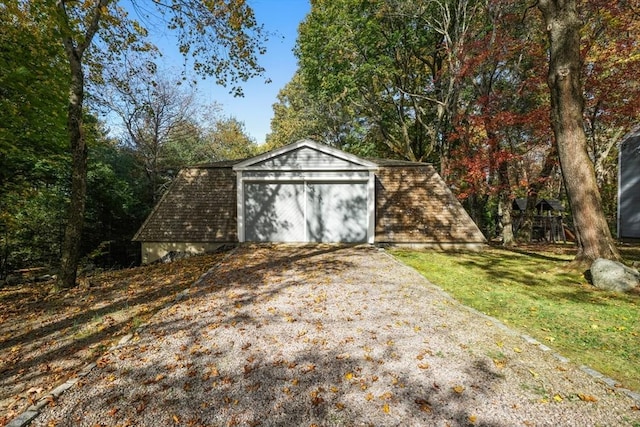 view of outbuilding featuring a garage