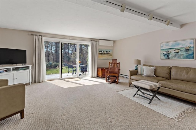 carpeted living area featuring track lighting, a wall mounted air conditioner, and a baseboard radiator