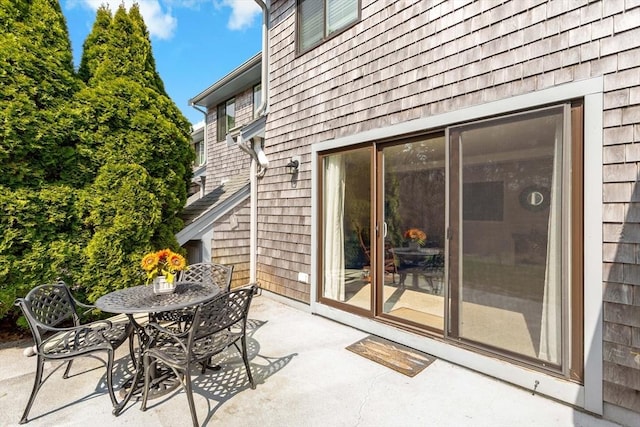 view of patio featuring outdoor dining space