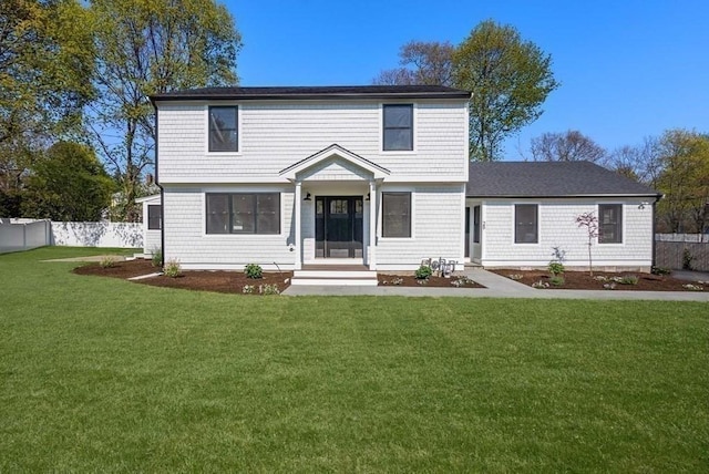 view of front of property with a front lawn