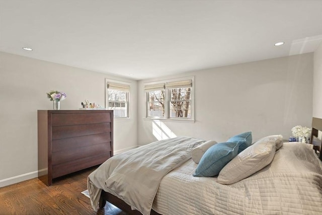 bedroom featuring recessed lighting, baseboards, and wood finished floors