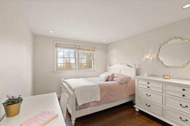 bedroom with dark wood finished floors and recessed lighting