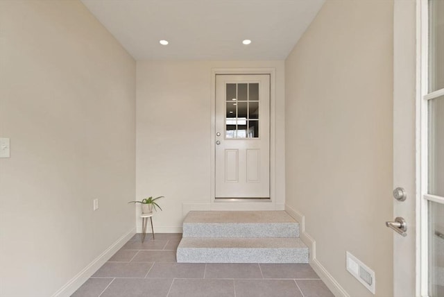 doorway to property featuring visible vents