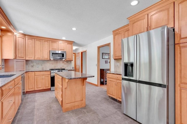 5 Evergreen Cir, Wilbraham, MA 01095 - kitchen featuring stainless steel appliances, light brown cabinetry, recessed lighting, stone counters, and tasteful backsplash