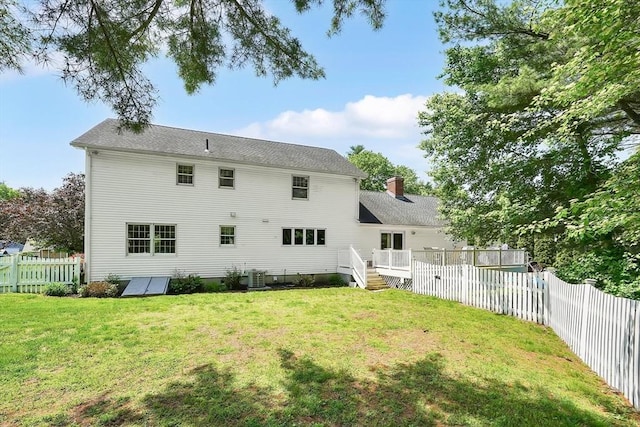 5 Evergreen Cir, Wilbraham, MA 01095 - rear view of property with cooling unit, a deck, and a chimney