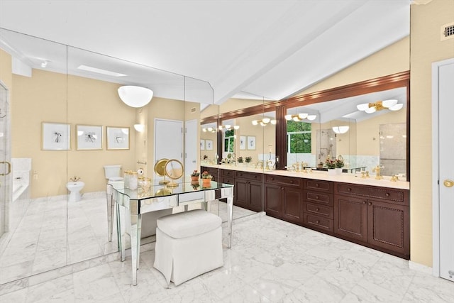 bathroom featuring a shower stall, lofted ceiling, a bidet, marble finish flooring, and vanity