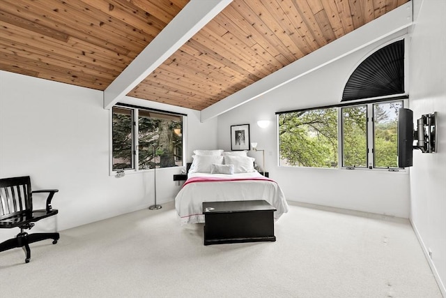 bedroom featuring wood ceiling and carpet flooring
