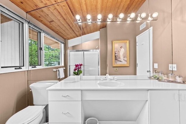 bathroom featuring wooden ceiling, vanity, a shower stall, toilet, and vaulted ceiling